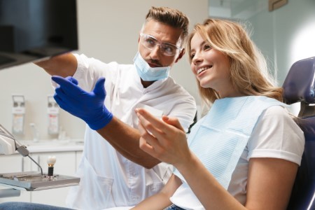 orthodontist with patient